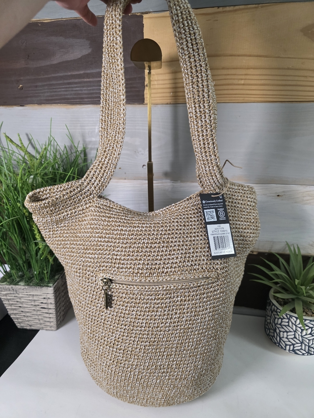The Sak Woven Straw Hobo Bag in Natural Beige